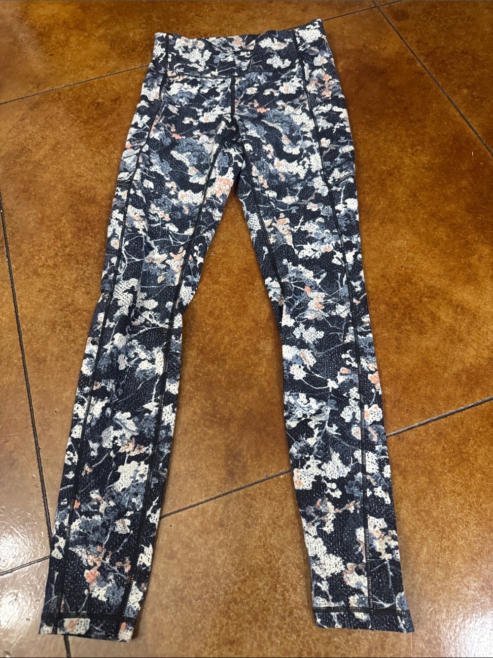 lululemon athletica Black Floral Print Leggings with Blush Accents